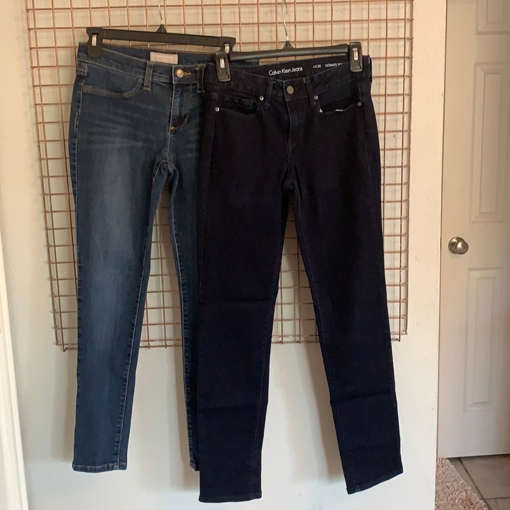 bundle of dark wash jeans